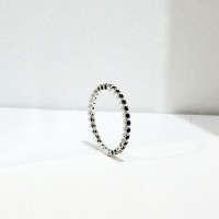 Black dot ring