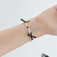 triple black ribbon pearl-bracelet